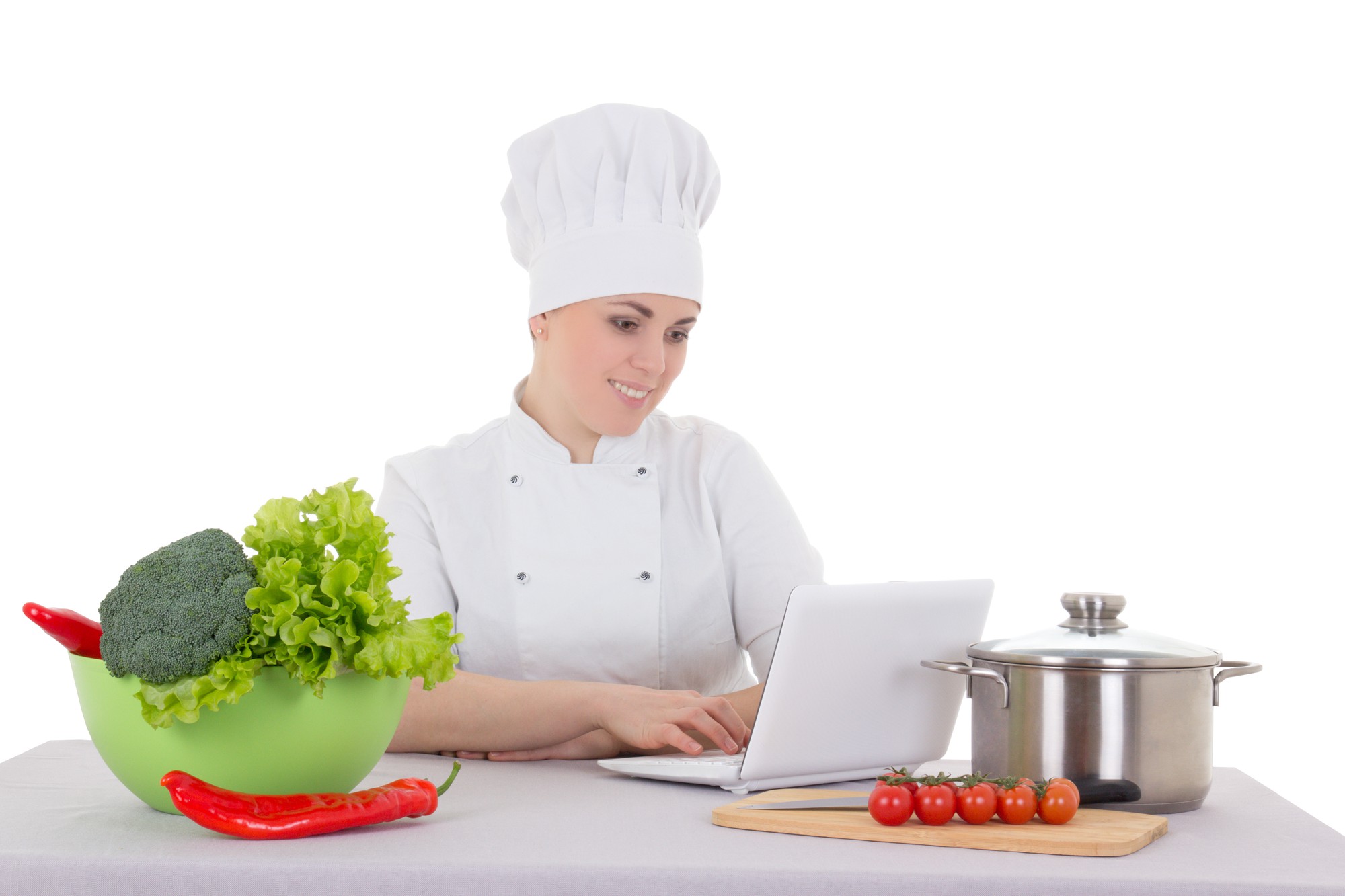 Studio cucina con chef e laptop